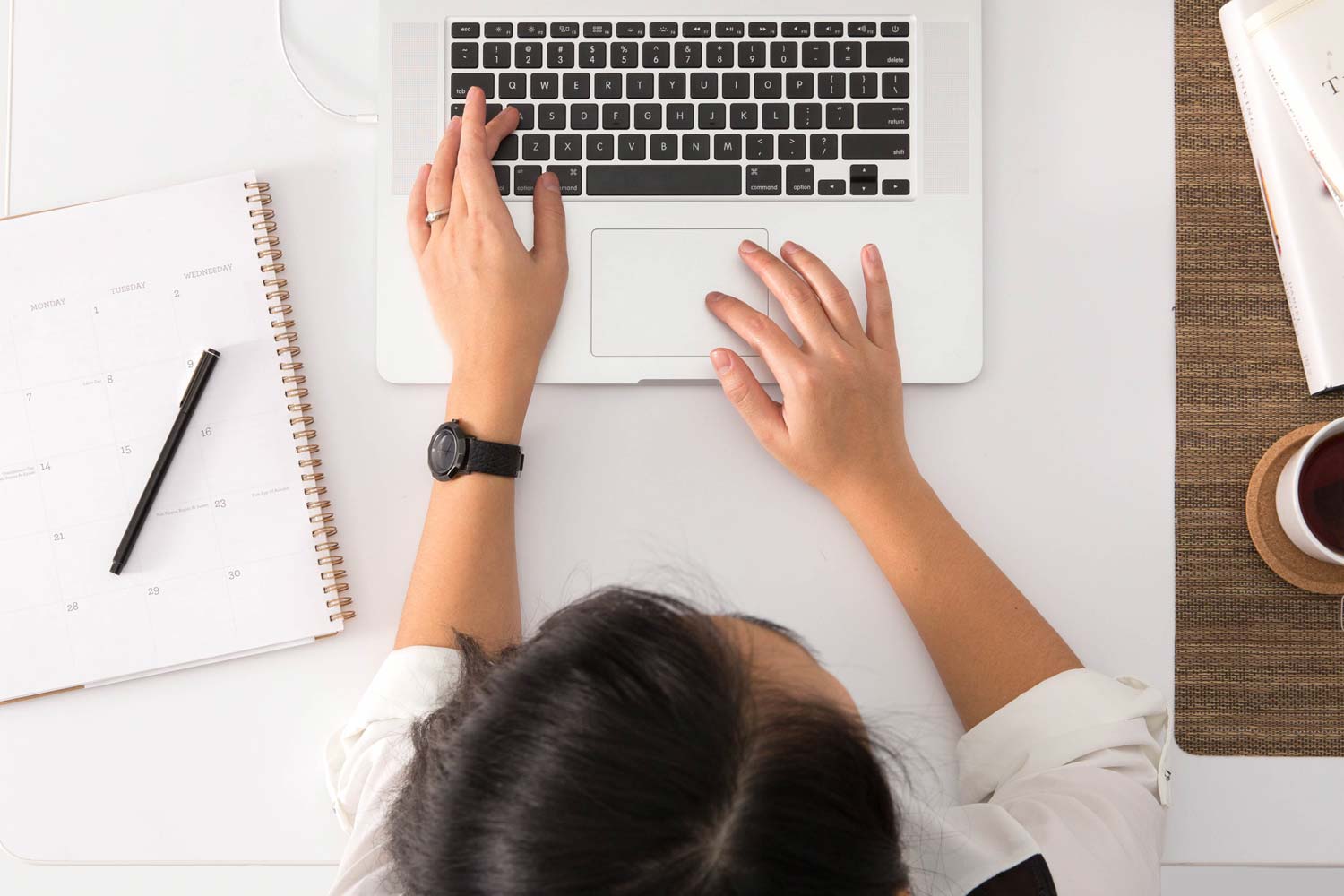 Women works on laptop to manage finances