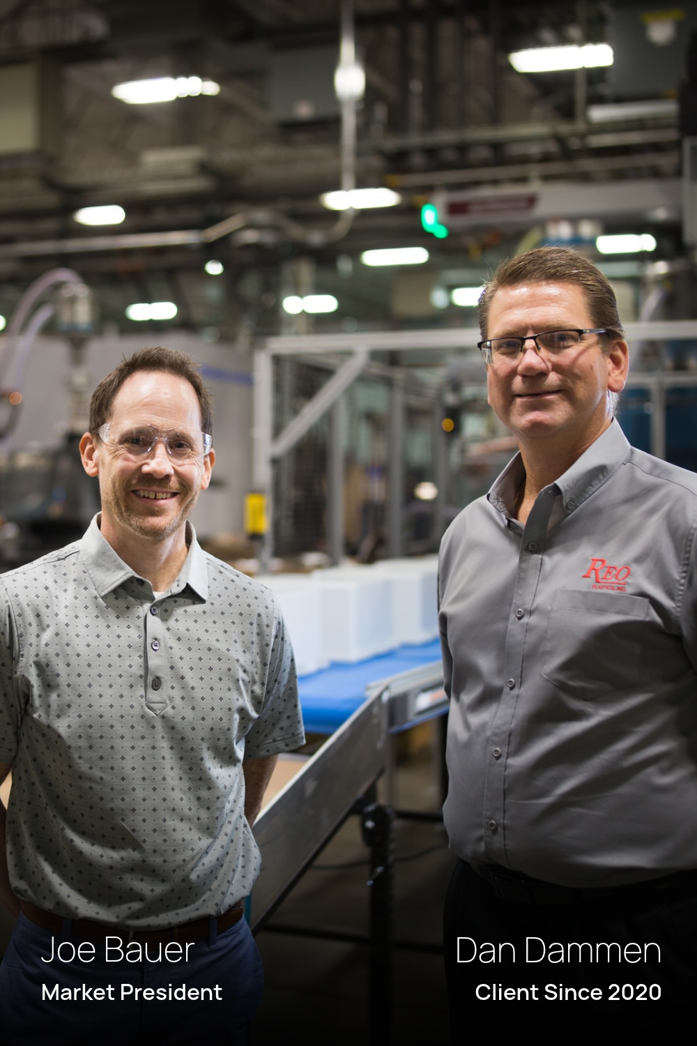 Two smiling men, Joe Bauer (Market President) wearing clear safety glasses and a short-sleeved patterned polo shirt on the left, and Dan Dammen (Client Since 2020) wearing glasses and a grey button-down shirt